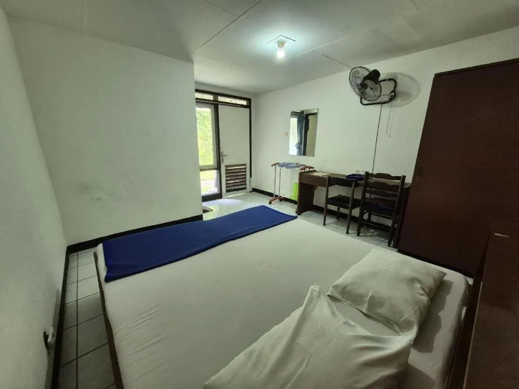 Bed in Capital O 94094 New Lembah Nyiur