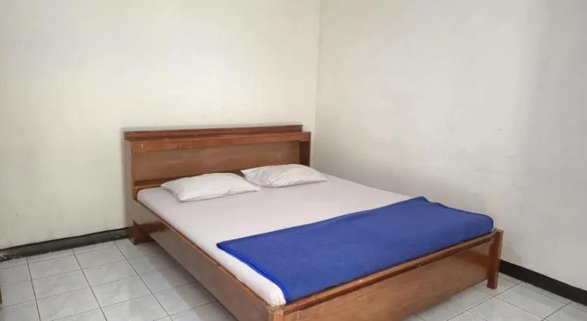 Bed in Capital O 94094 New Lembah Nyiur