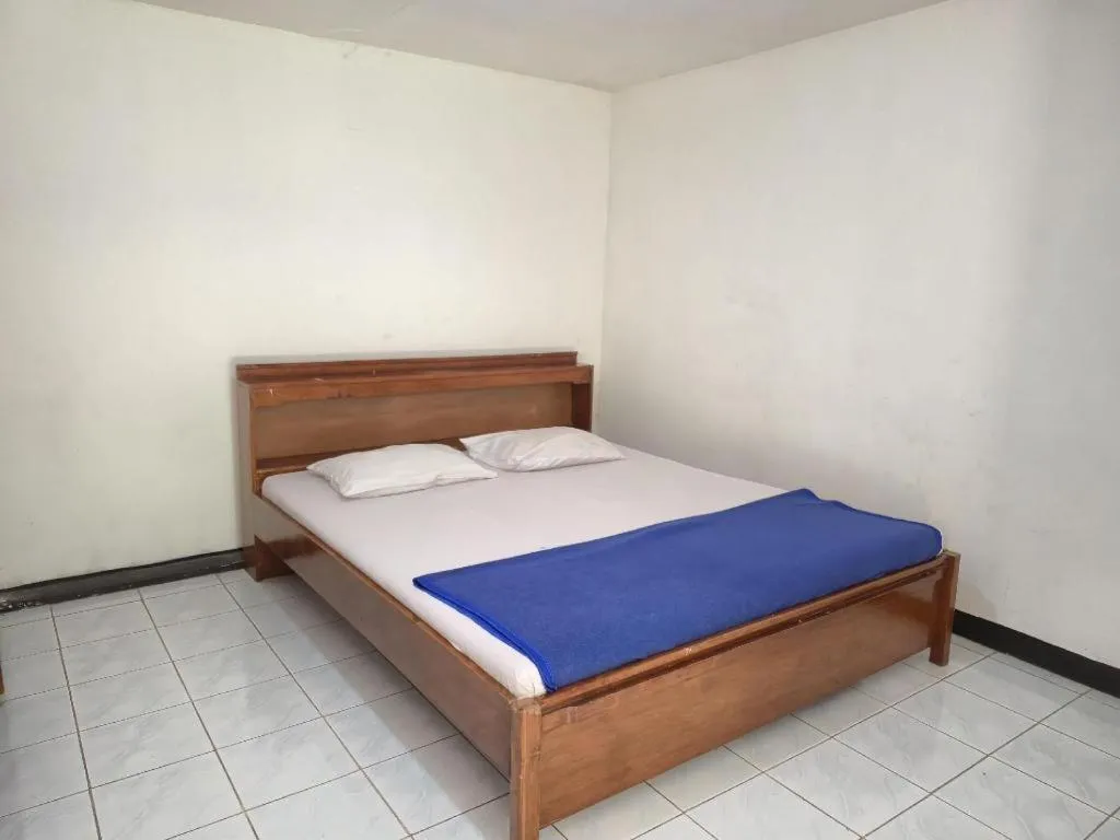 Bed in Capital O 94094 New Lembah Nyiur