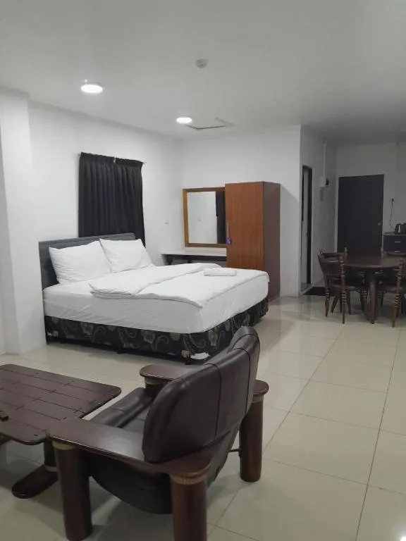 Bed in White Diamond Apartment