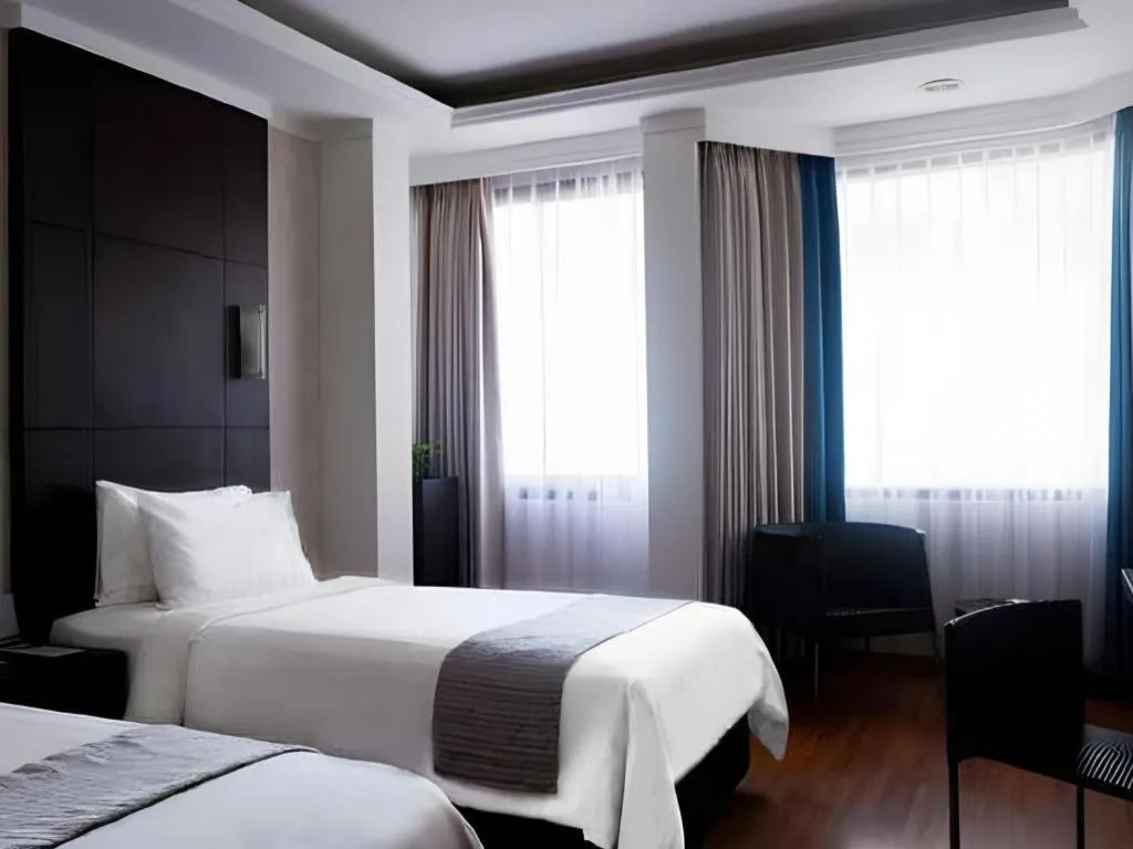 Bed in Bentani Hotel & Residence