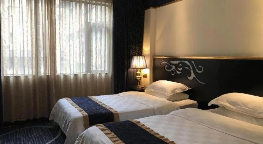 Bed in Guilin Sapphire hotel