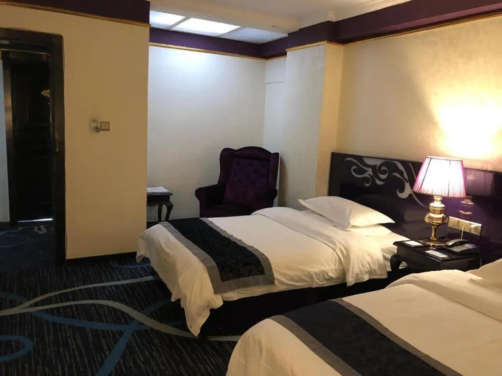 Bed in Guilin Sapphire hotel