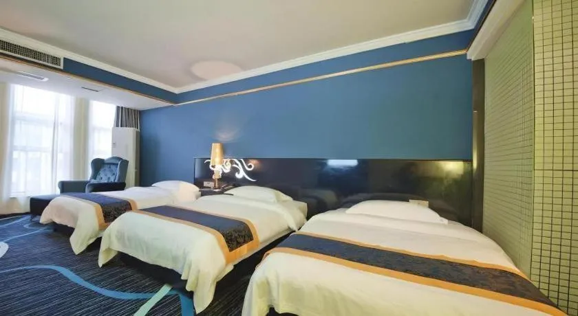 Bed in Guilin Sapphire hotel