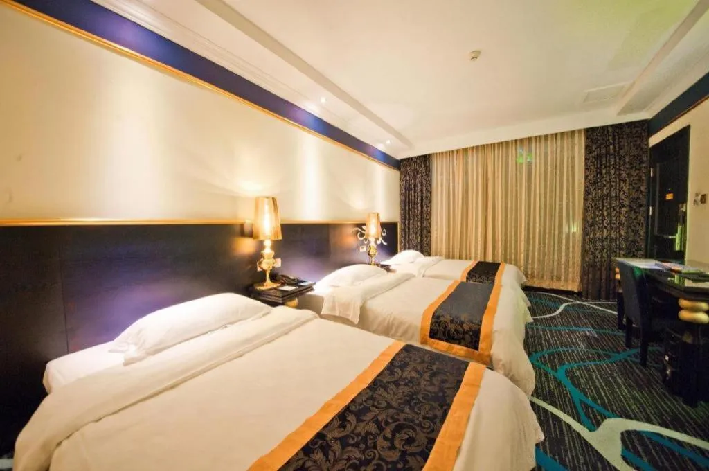 Bed in Guilin Sapphire hotel