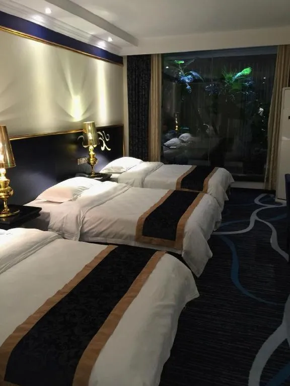 Bed in Guilin Sapphire hotel