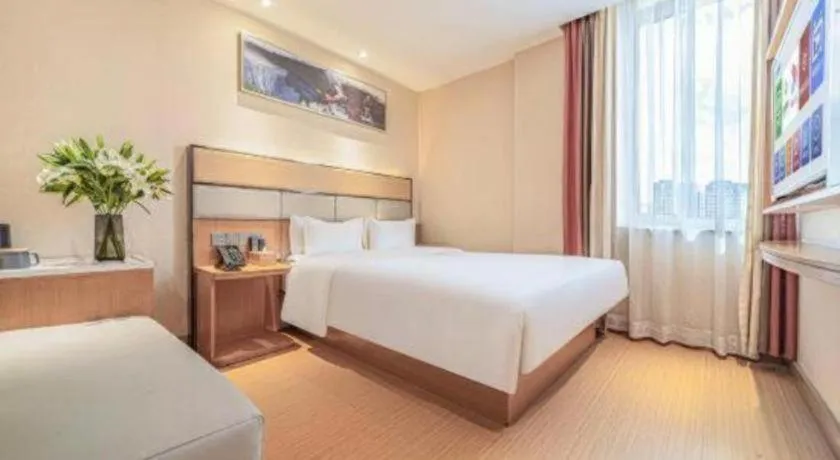 Bed in GreenTree Inn Geermu Walking Street Business Hotel