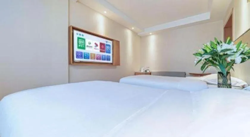 Bed in GreenTree Inn Geermu Walking Street Business Hotel