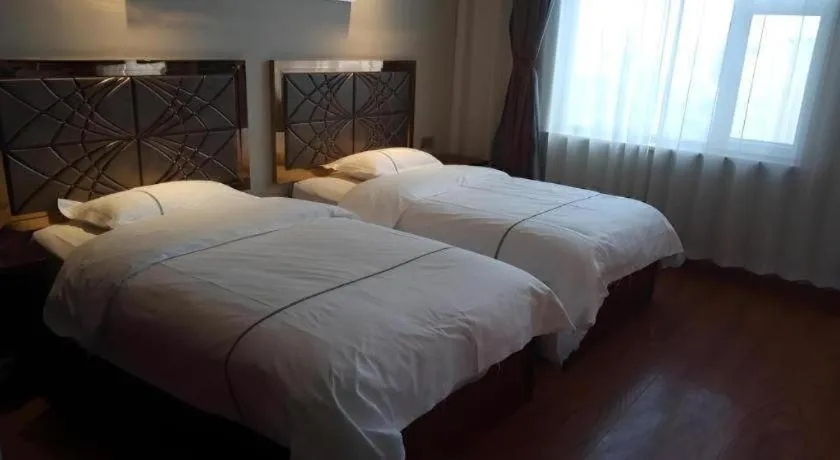 Bed in GreenTree Inn Geermu Walking Street Business Hotel