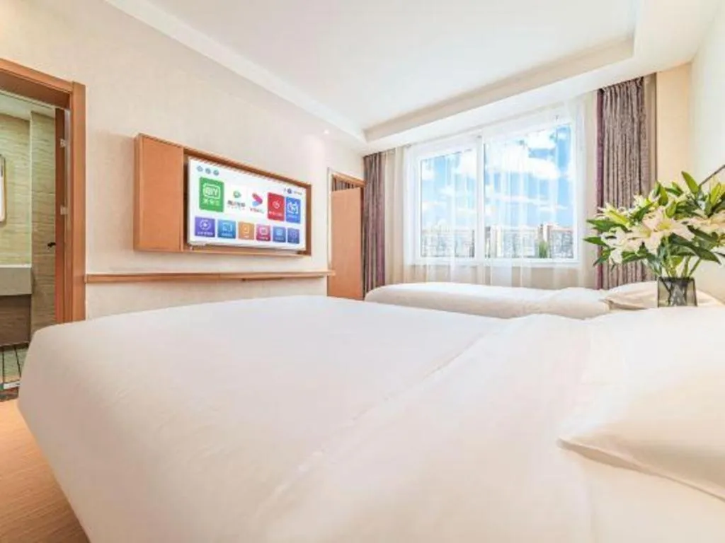 Bed in GreenTree Inn Geermu Walking Street Business Hotel