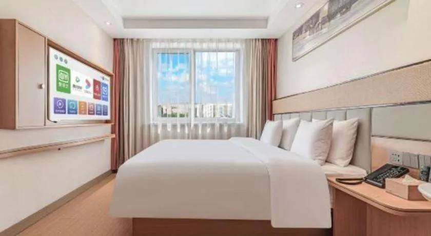 Bed in GreenTree Inn Geermu Walking Street Business Hotel