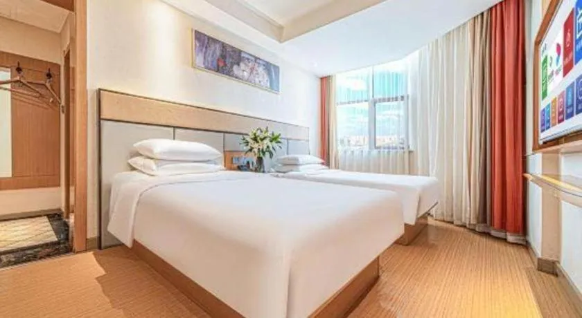 Bed in GreenTree Inn Geermu Walking Street Business Hotel