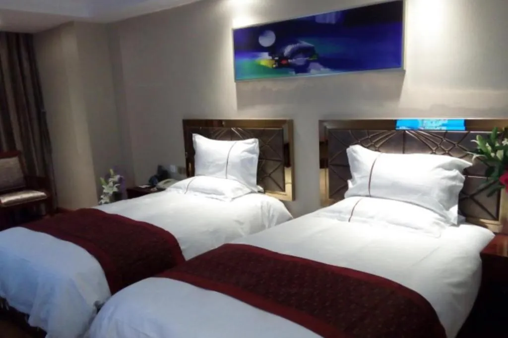 Bed in GreenTree Inn Geermu Walking Street Business Hotel