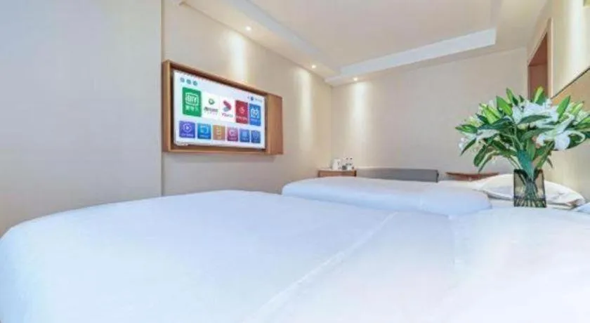 Bed in GreenTree Inn Geermu Walking Street Business Hotel