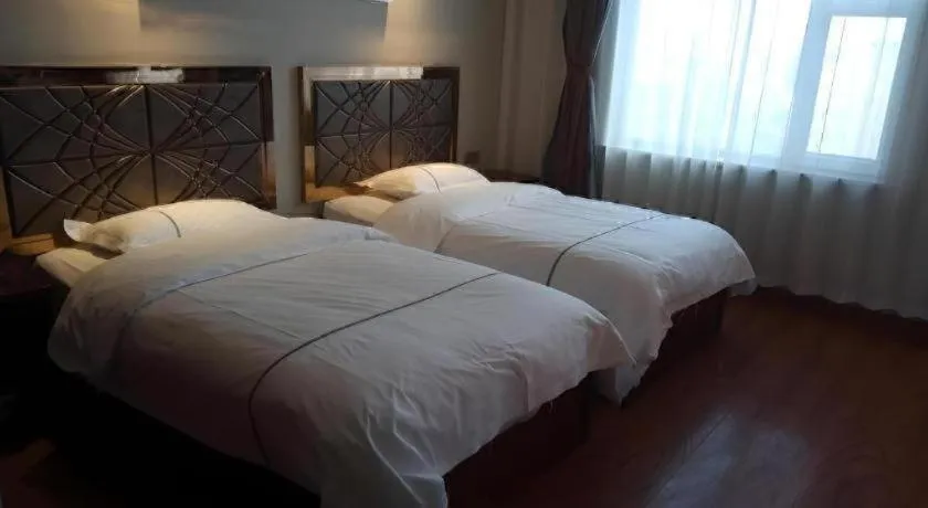 Bed in GreenTree Inn Geermu Walking Street Business Hotel