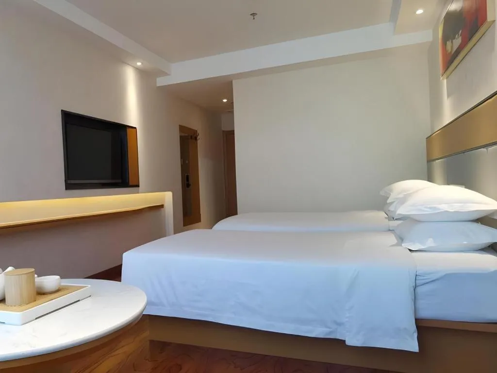 Bed in GreenTree Inn Geermu Walking Street Business Hotel