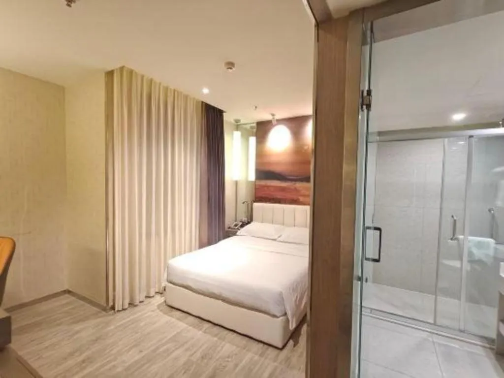 Bed in Jinjiang Metropolo Hotel Shenyang Country Garden Datong Lake Subway Station Branch