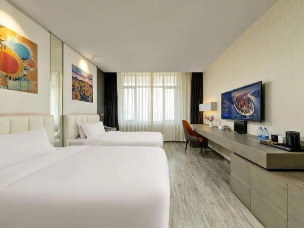 Bed in Jinjiang Metropolo Hotel Shenyang Country Garden Datong Lake Subway Station Branch