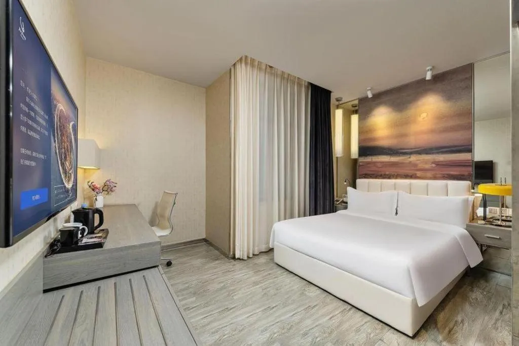 Bed in Jinjiang Metropolo Hotel Shenyang Country Garden Datong Lake Subway Station Branch