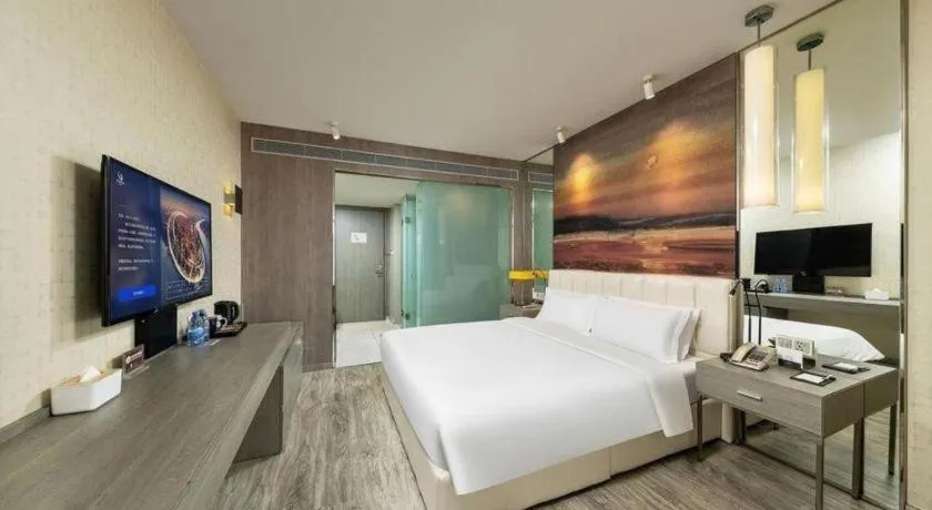 Bed in Jinjiang Metropolo Hotel Shenyang Country Garden Datong Lake Subway Station Branch