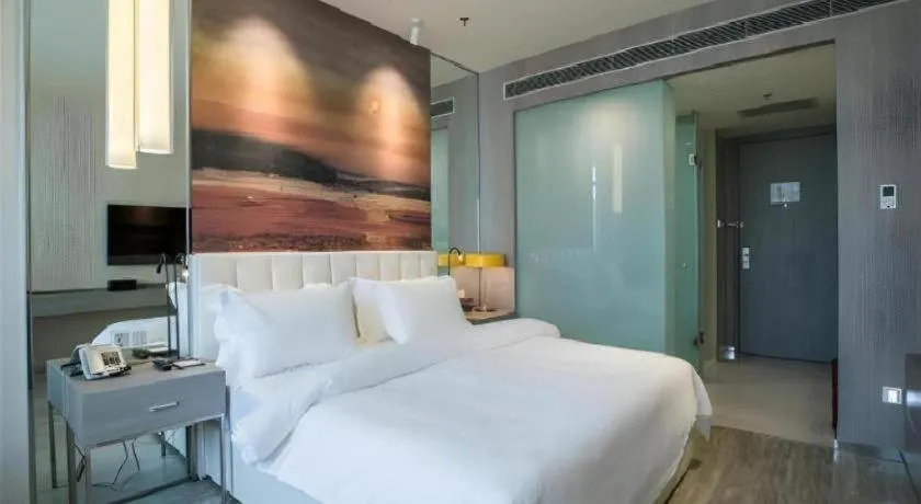 Bed in Jinjiang Metropolo Hotel Shenyang Country Garden Datong Lake Subway Station Branch