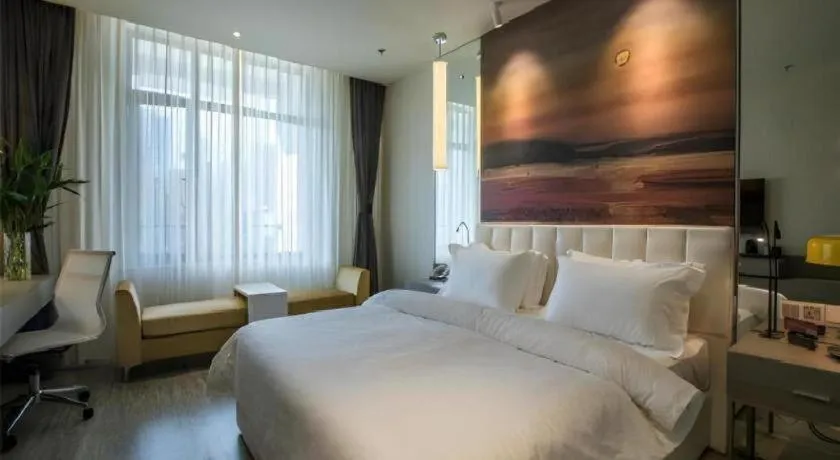 Bed in Jinjiang Metropolo Hotel Shenyang Country Garden Datong Lake Subway Station Branch