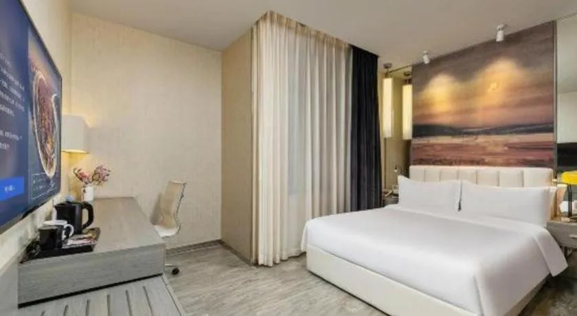 Bed in Jinjiang Metropolo Hotel Shenyang Country Garden Datong Lake Subway Station Branch