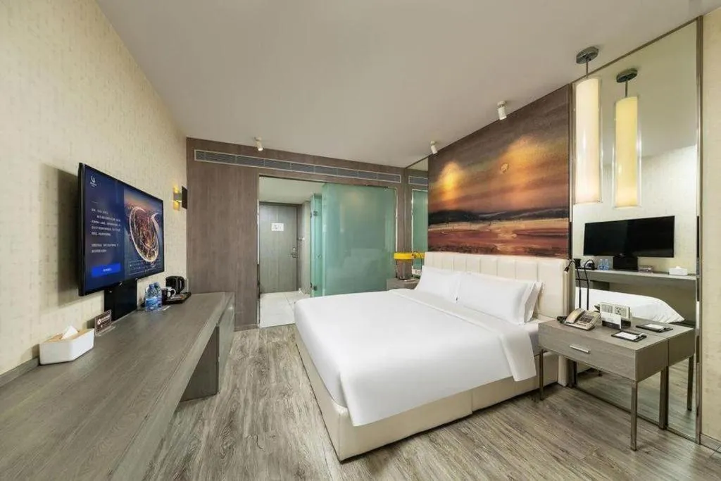 Bed in Jinjiang Metropolo Hotel Shenyang Country Garden Datong Lake Subway Station Branch