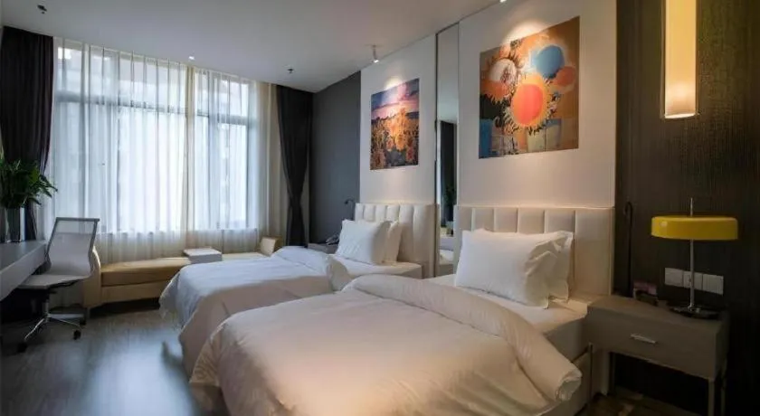 Bed in Jinjiang Metropolo Hotel Shenyang Country Garden Datong Lake Subway Station Branch