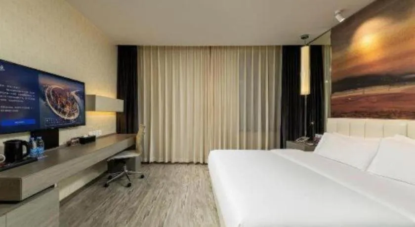 Bed in Jinjiang Metropolo Hotel Shenyang Country Garden Datong Lake Subway Station Branch