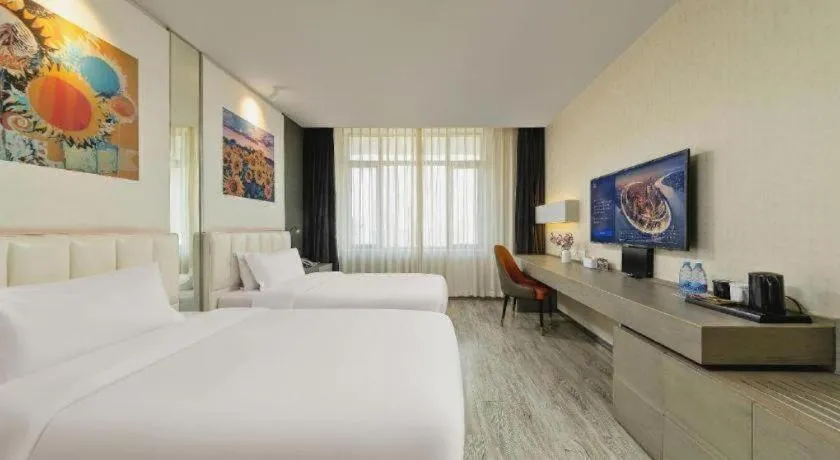 Bed in Jinjiang Metropolo Hotel Shenyang Country Garden Datong Lake Subway Station Branch