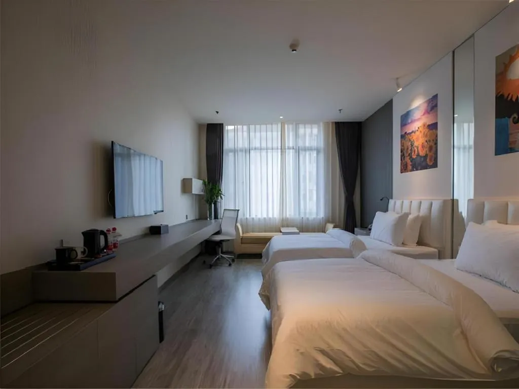 Bed in Jinjiang Metropolo Hotel Shenyang Country Garden Datong Lake Subway Station Branch