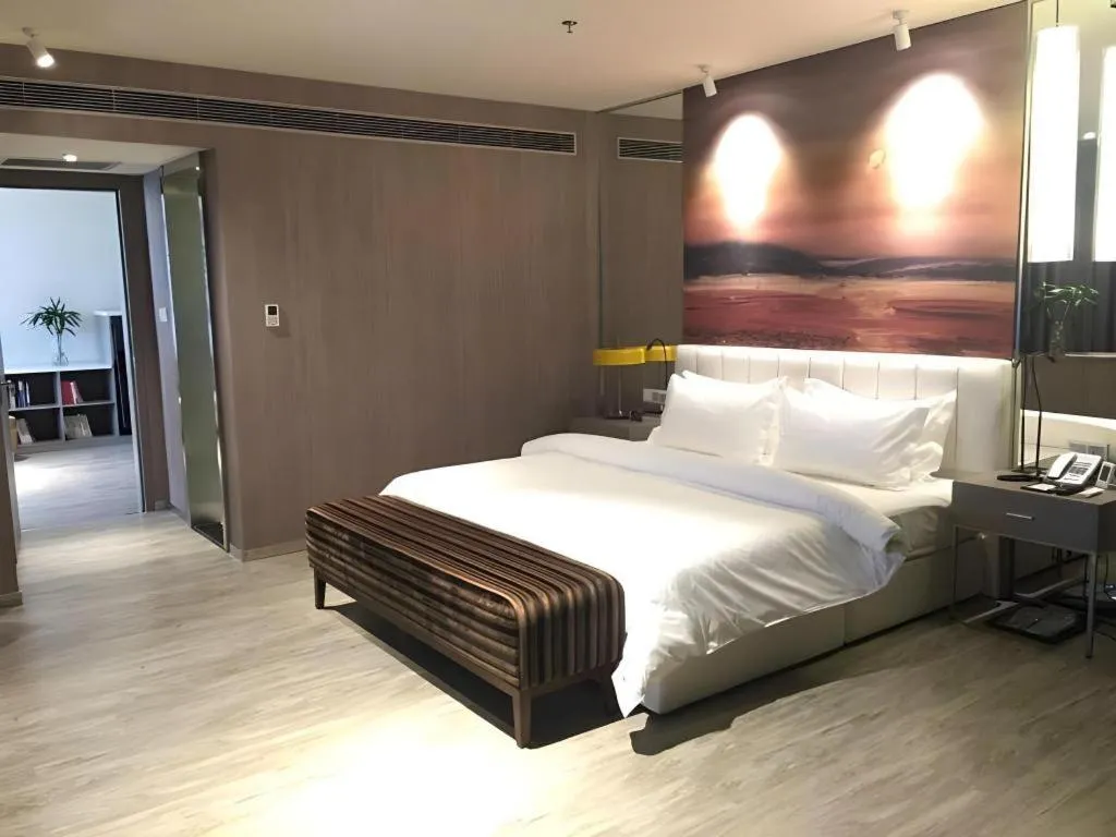 Bed in Jinjiang Metropolo Hotel Shenyang Country Garden Datong Lake Subway Station Branch