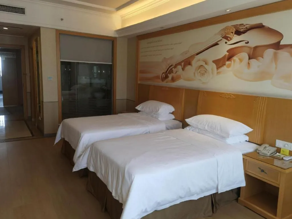 Bed in Vienna Hotel Chengdu Xinfan Furniture City
