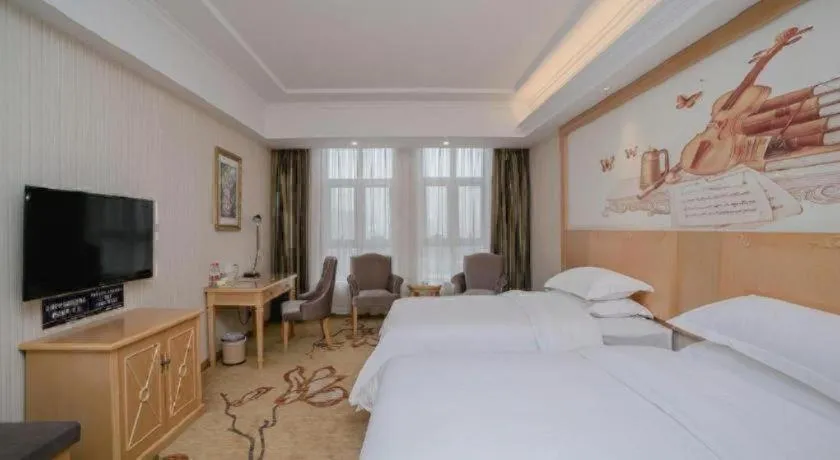 Bed in Vienna Hotel Chengdu Xinfan Furniture City