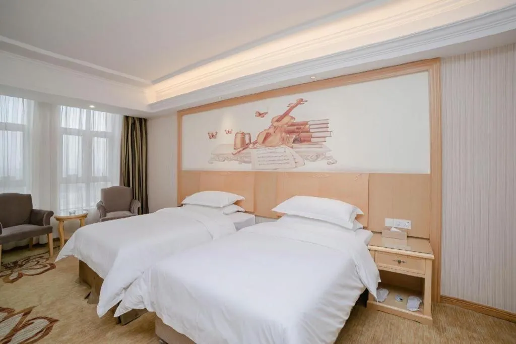 Bed in Vienna Hotel Chengdu Xinfan Furniture City