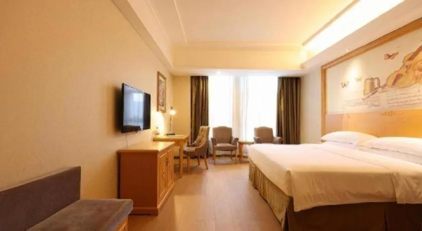 Bed in Vienna Hotel Chengdu Xinfan Furniture City