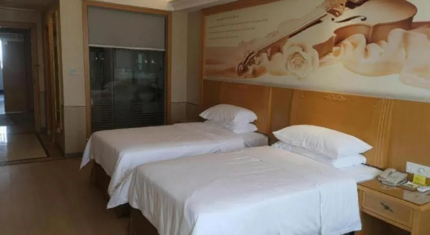 Bed in Vienna Hotel Chengdu Xinfan Furniture City