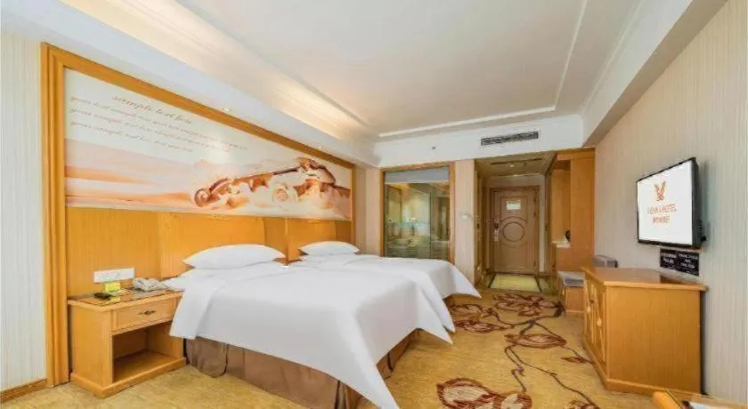 Bed in Vienna Hotel Chengdu Xinfan Furniture City