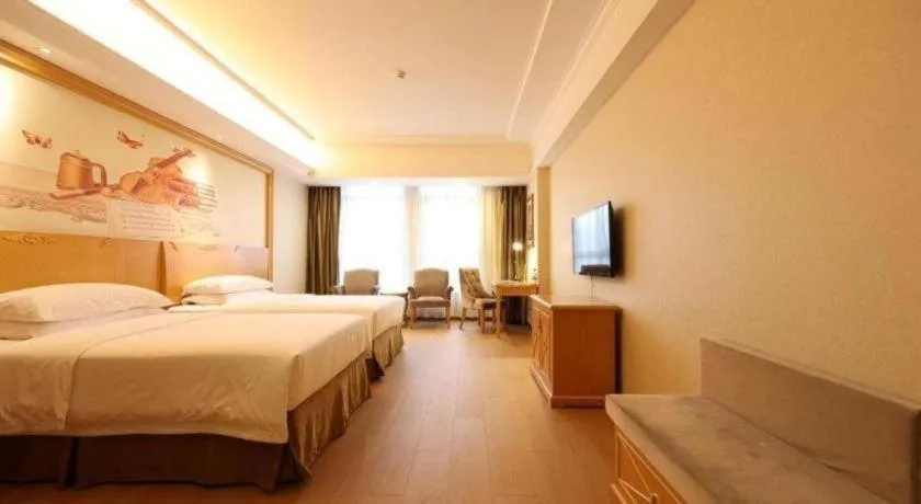 Bed in Vienna Hotel Chengdu Xinfan Furniture City