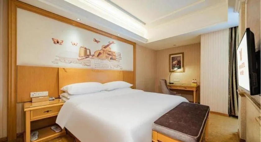 Bed in Vienna Hotel Chengdu Xinfan Furniture City