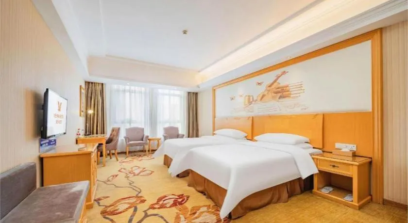 Bed in Vienna Hotel Chengdu Xinfan Furniture City