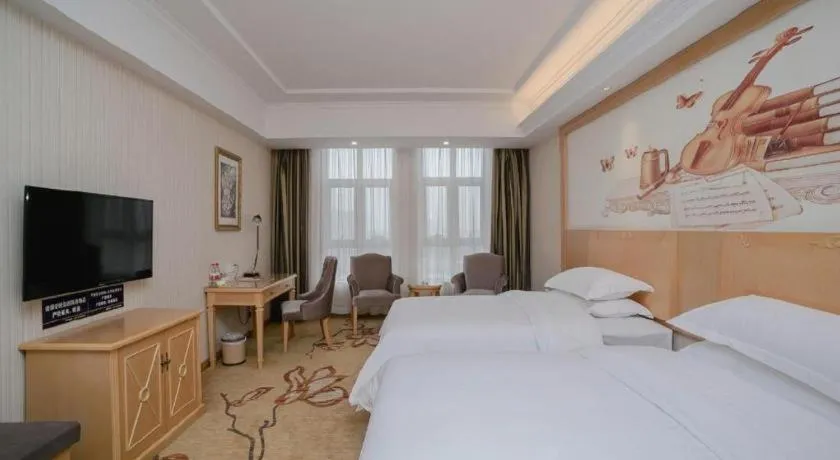 Bed in Vienna Hotel Chengdu Xinfan Furniture City