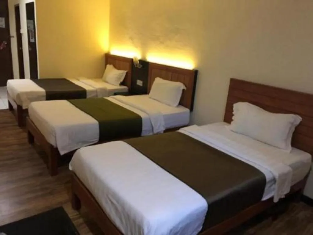 Bed in Hotel Sarina