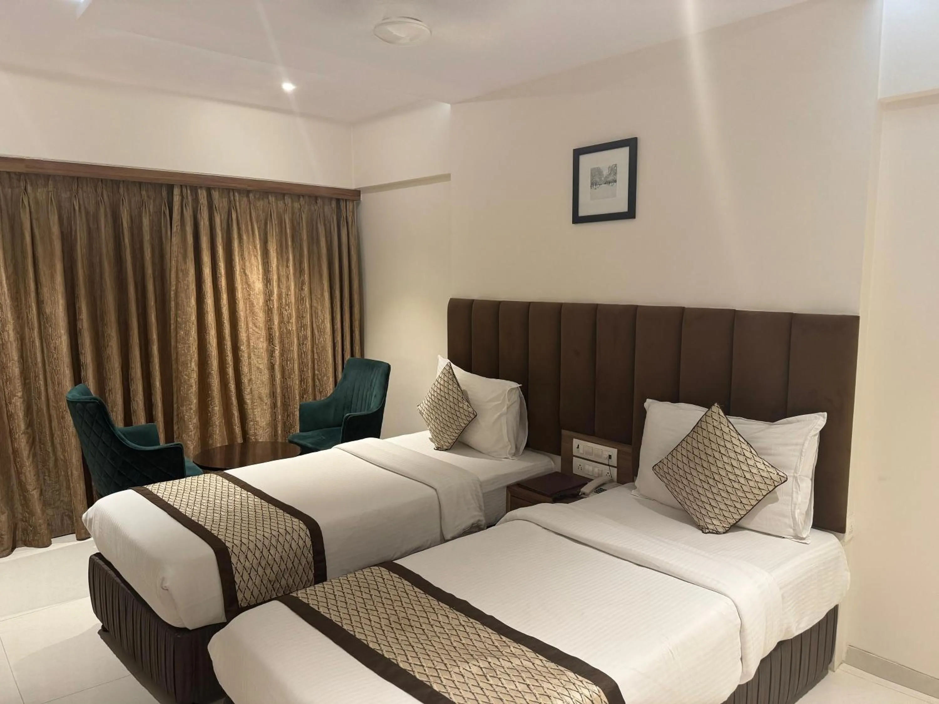 Bed in Hotel Pacific Residency