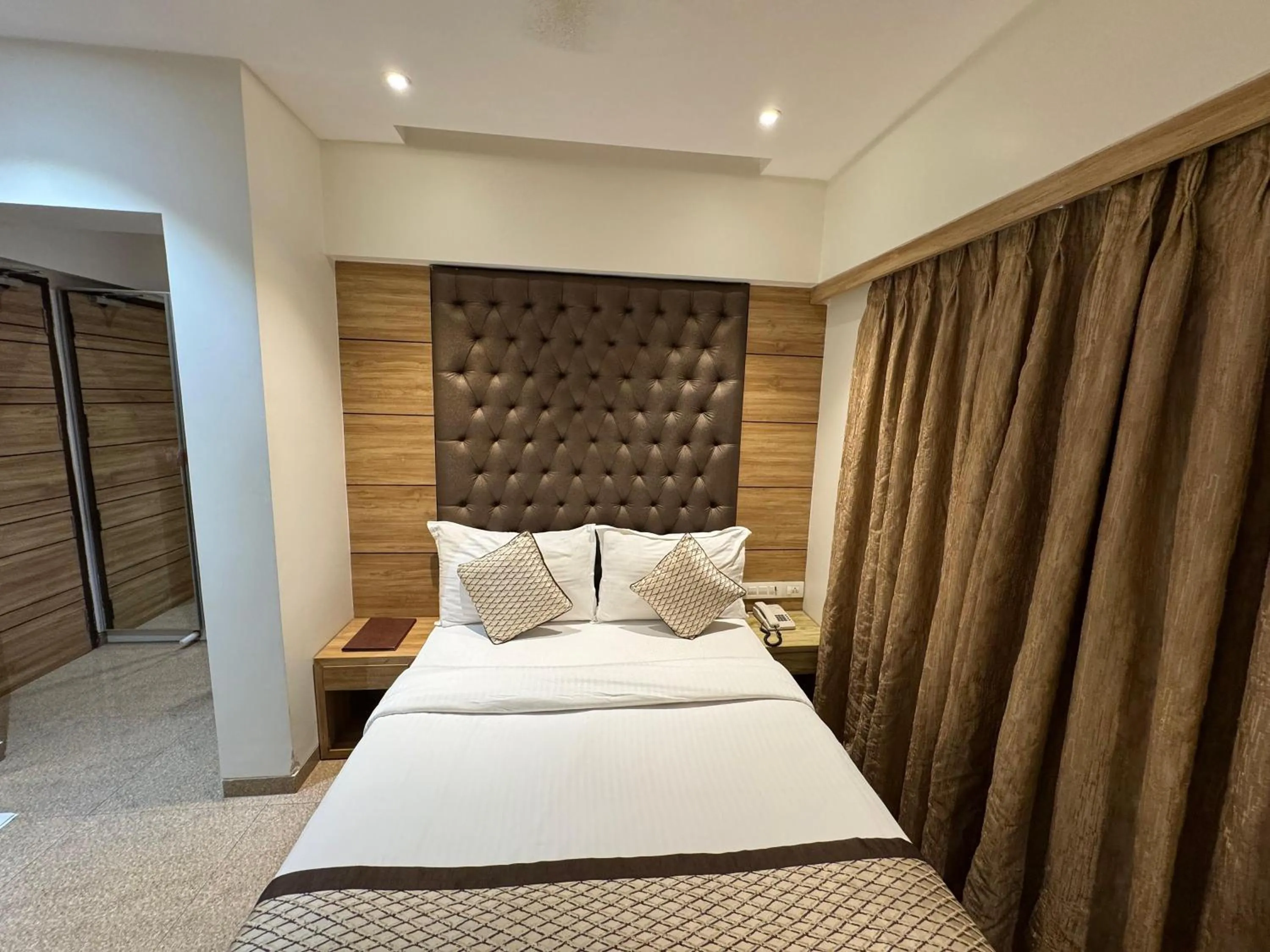 Bed in Hotel Pacific Residency