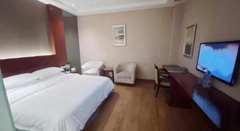 Bed in Santavan Hotel Shenzhen Guangming