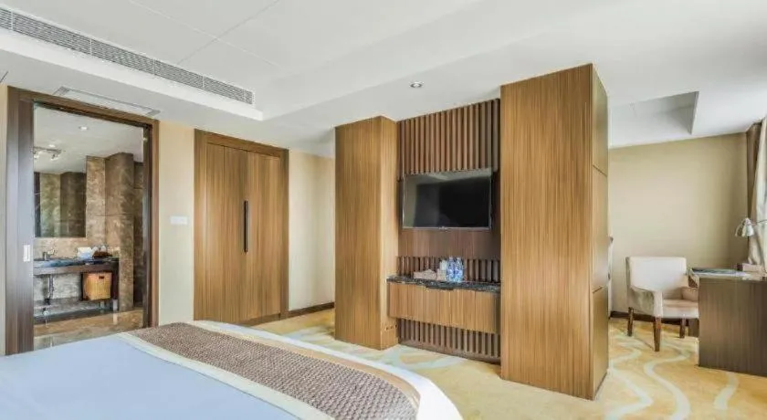 Bed in Santavan Hotel Shenzhen Guangming