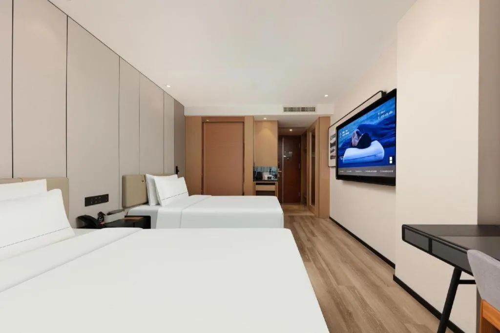 Bed in Atour Hotel Xiamen City Government Dongdu Passenger Transport Terminal