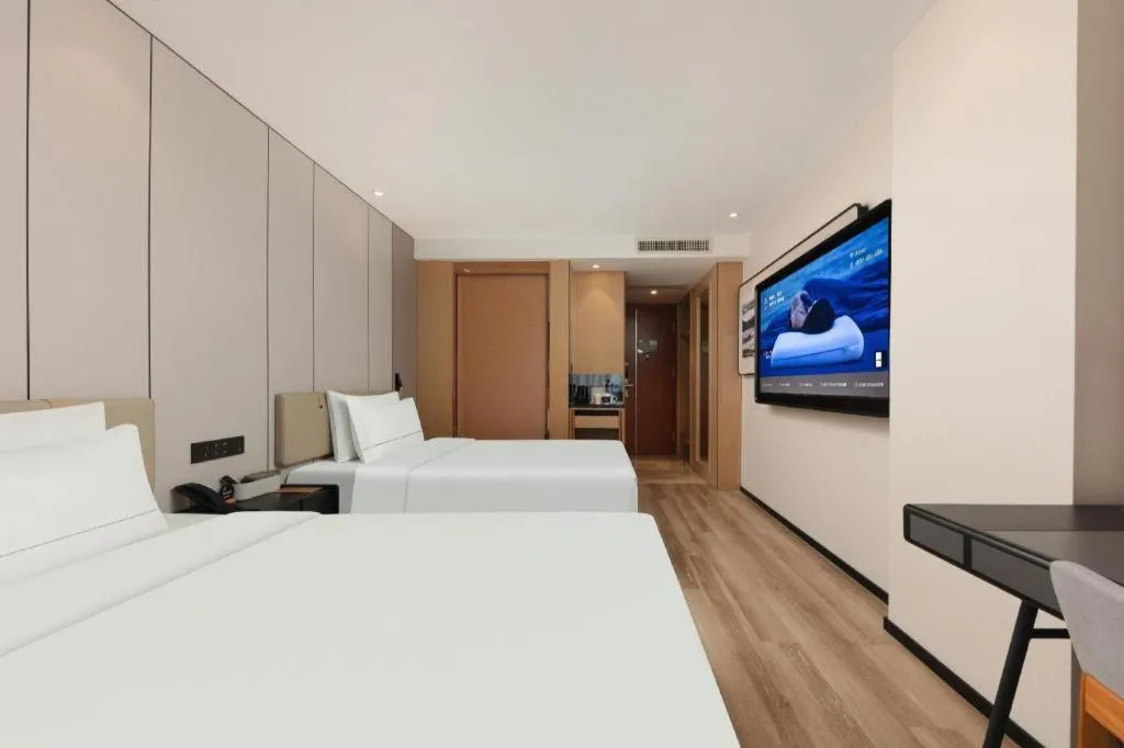 Bed in Atour Hotel Xiamen City Government Dongdu Passenger Transport Terminal
